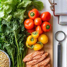 Healthy meal prep and fresh ingredients, symbolizing nutrition coaching.